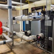 Installation de 2 chaudières à gaz, BOSCH, montées en cascade.